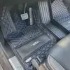 Custom leather floor mats installed in Tesla Cybertruck Driver's Side
