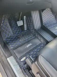 Custom leather floor mats installed in Tesla Cybertruck Driver's Side